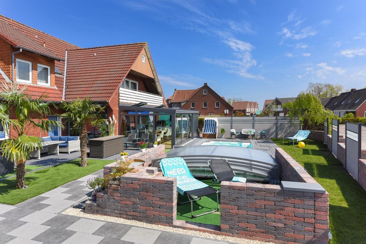 Ferienwohnung Haus Zum Seehund Mit Pool Und Fruehstuecksoption Bensersiel Extérieur photo