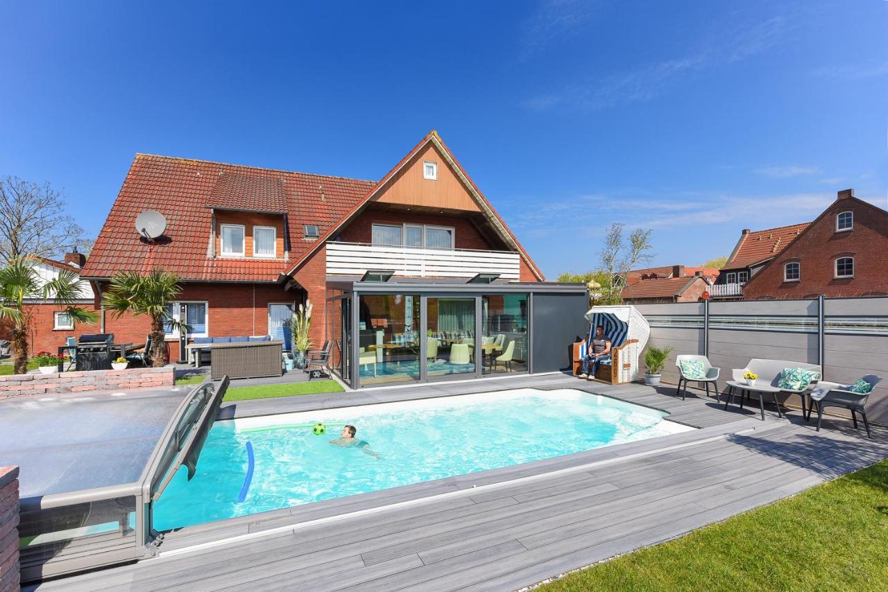 Ferienwohnung Haus Zum Seehund Mit Pool Und Fruehstuecksoption Bensersiel Extérieur photo